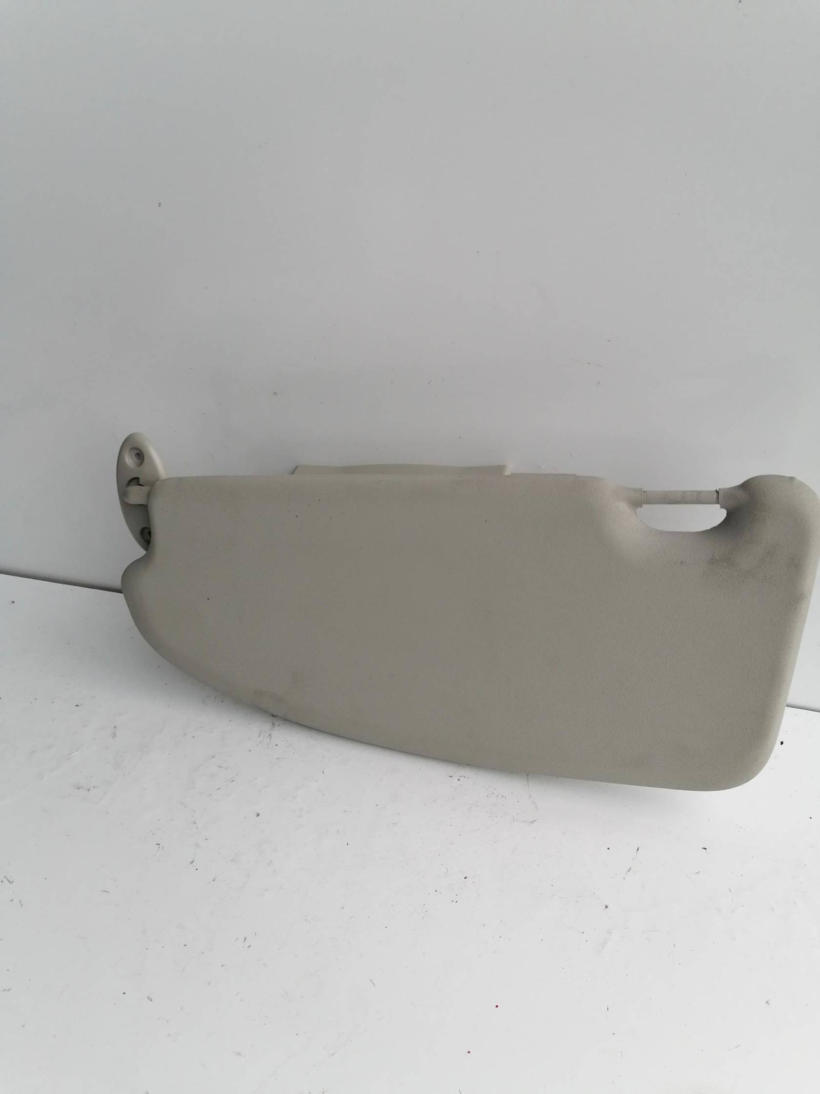 Aletta parasole parabrezza sx.